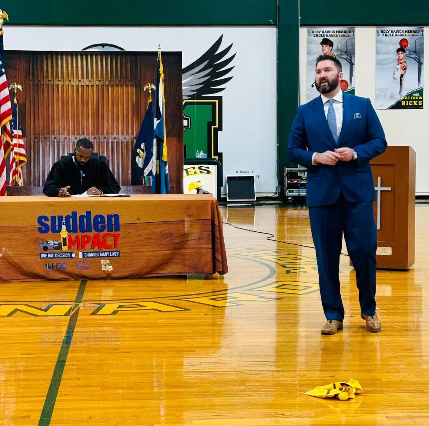 Stephen Spurgeon addressing students during a Sudden Impact mock trial in the Holy Savior Menard gym